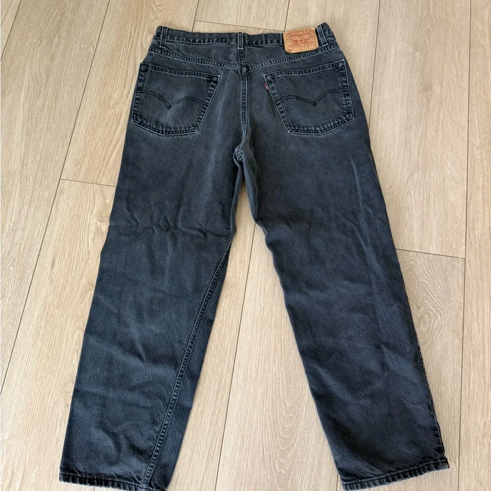 Levi's 550 Relaxed Fit Men's Jeans in Distressed Black 38x30